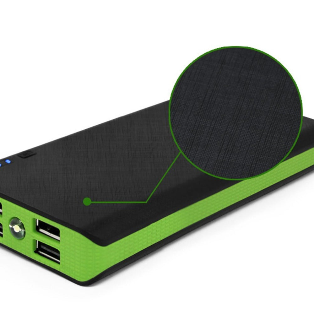 Black and green power bank with close-up of texture detail on a white background