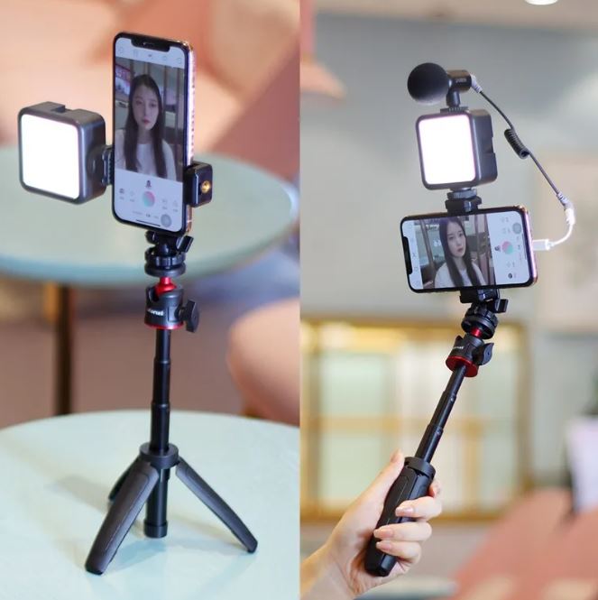 Mobile Phone Vlog Selfie two showing side by side one standing with tripod one handheld.