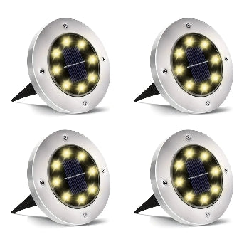 Four solar-powered outdoor lights with visible solar panels on a white background