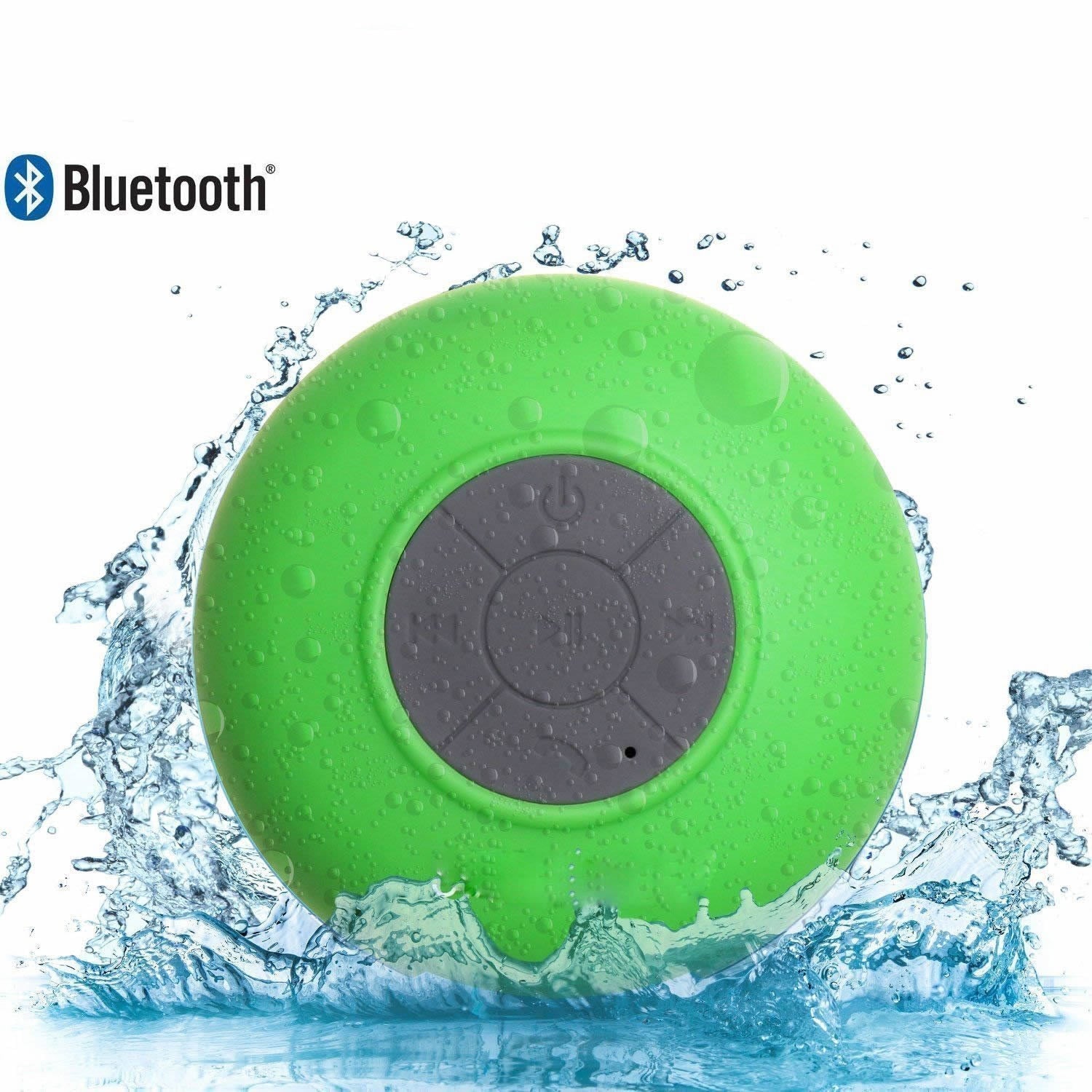 Green Bluetooth shower speaker with water splashes on a white background