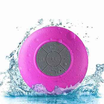 Singing in the Shower - Ultimate Shower Phone Speaker for an Immersive Experience pink round speaker with water around it