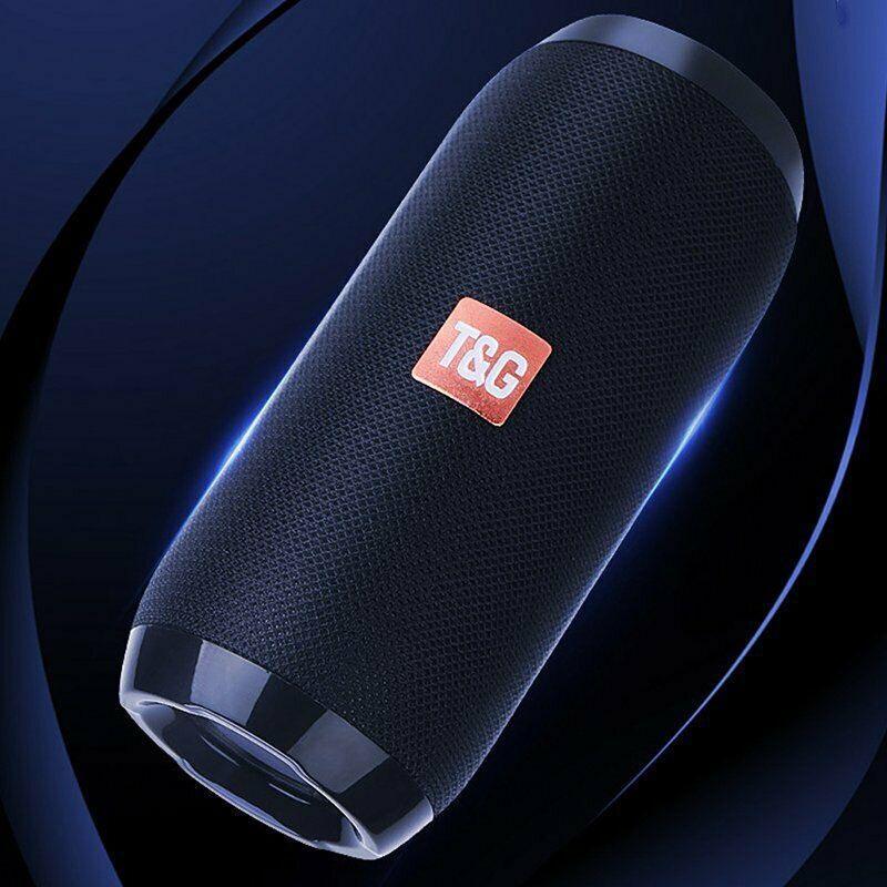 Black portable speaker with a red logo on a dark background