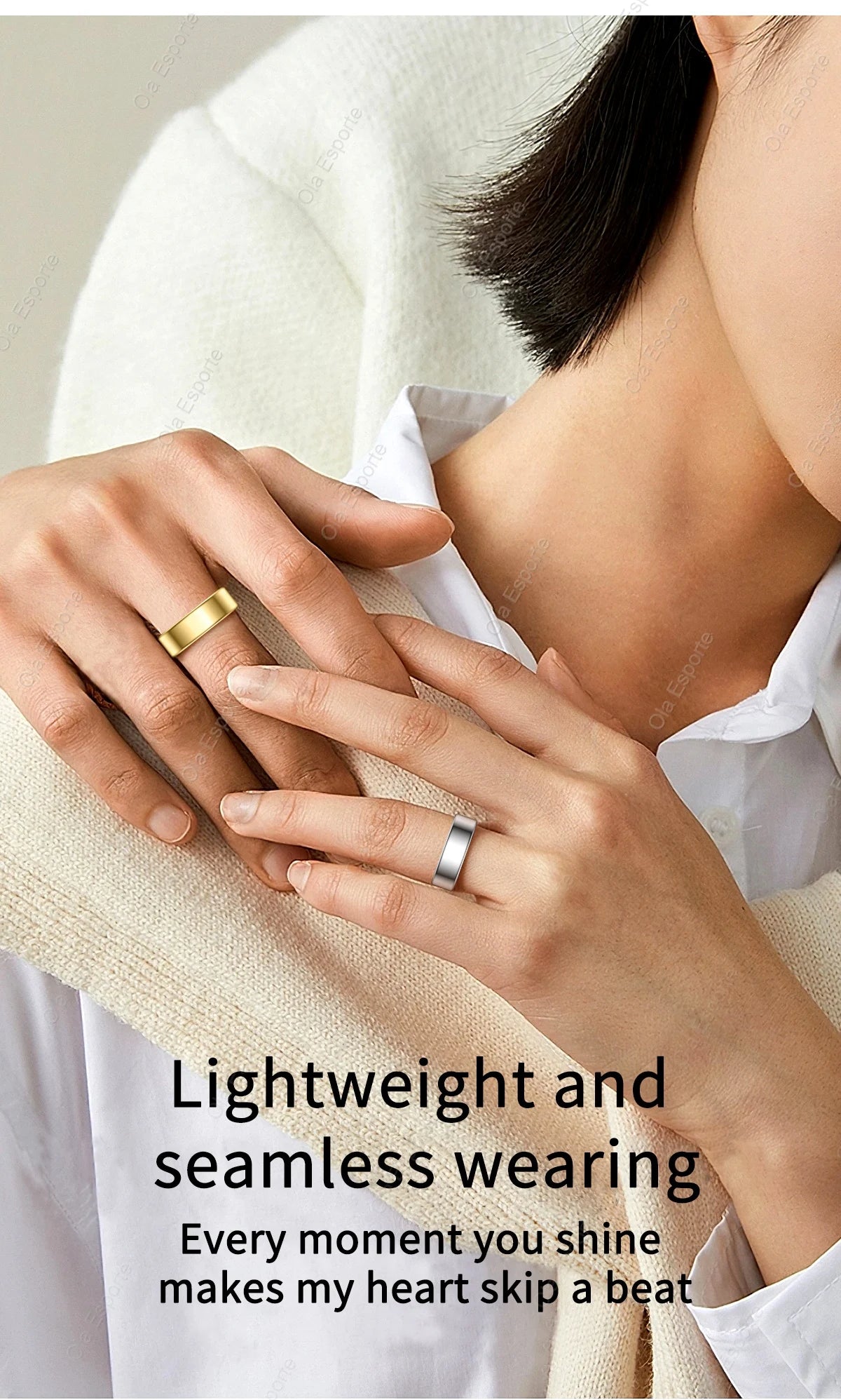 Close-up of hands wearing gold and silver rings with a light background