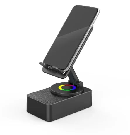 Black wireless charging stand with smartphone on a white background