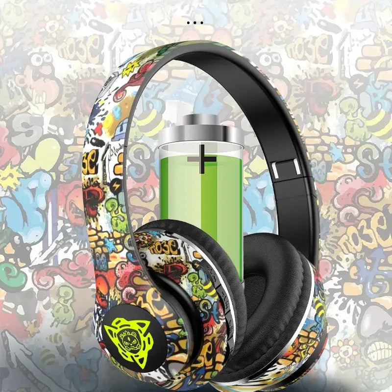 Colorful graffiti-style headphones on a multicolored abstract background