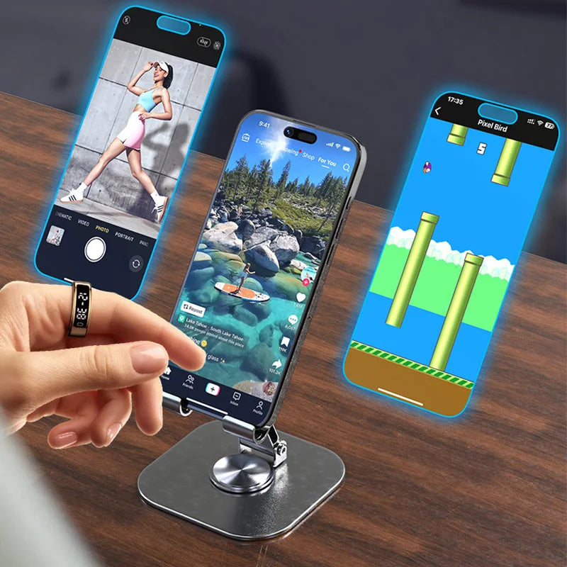 Phone stand with three smartphones displaying different apps on a wooden surface.