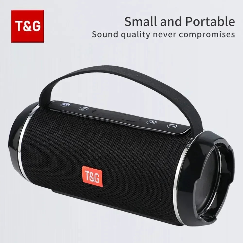 Black portable speaker with T&G logo on a light gray background