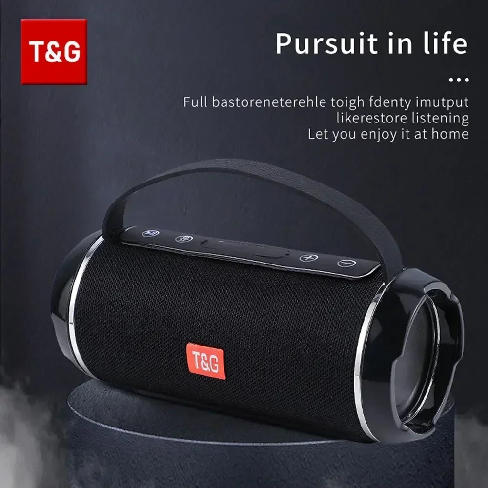 Black portable speaker with T&G logo on a dark background