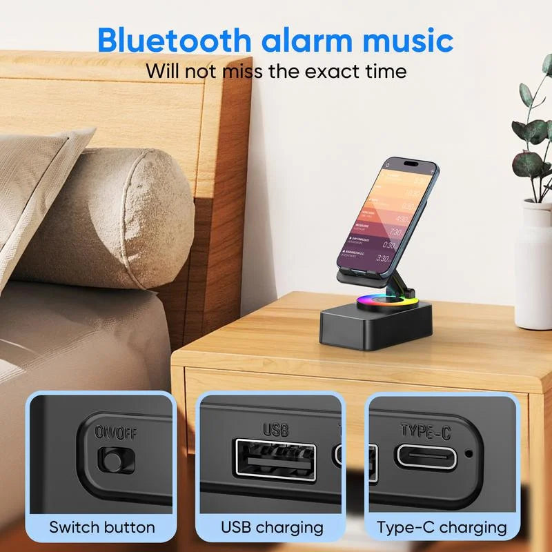 Bedside table with wireless charging pad, smartphone, and nightstand lamp, featuring Bluetooth alarm music text.