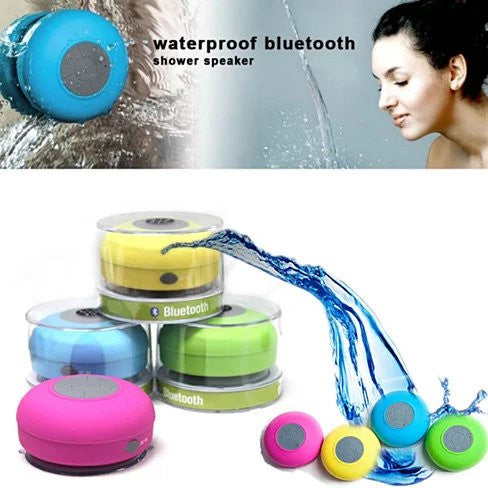 Waterproof Bluetooth shower speaker with colorful options and water splashing around it.