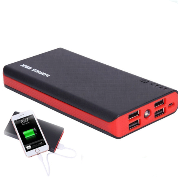 Black and red power bank with smartphone charging on a white background