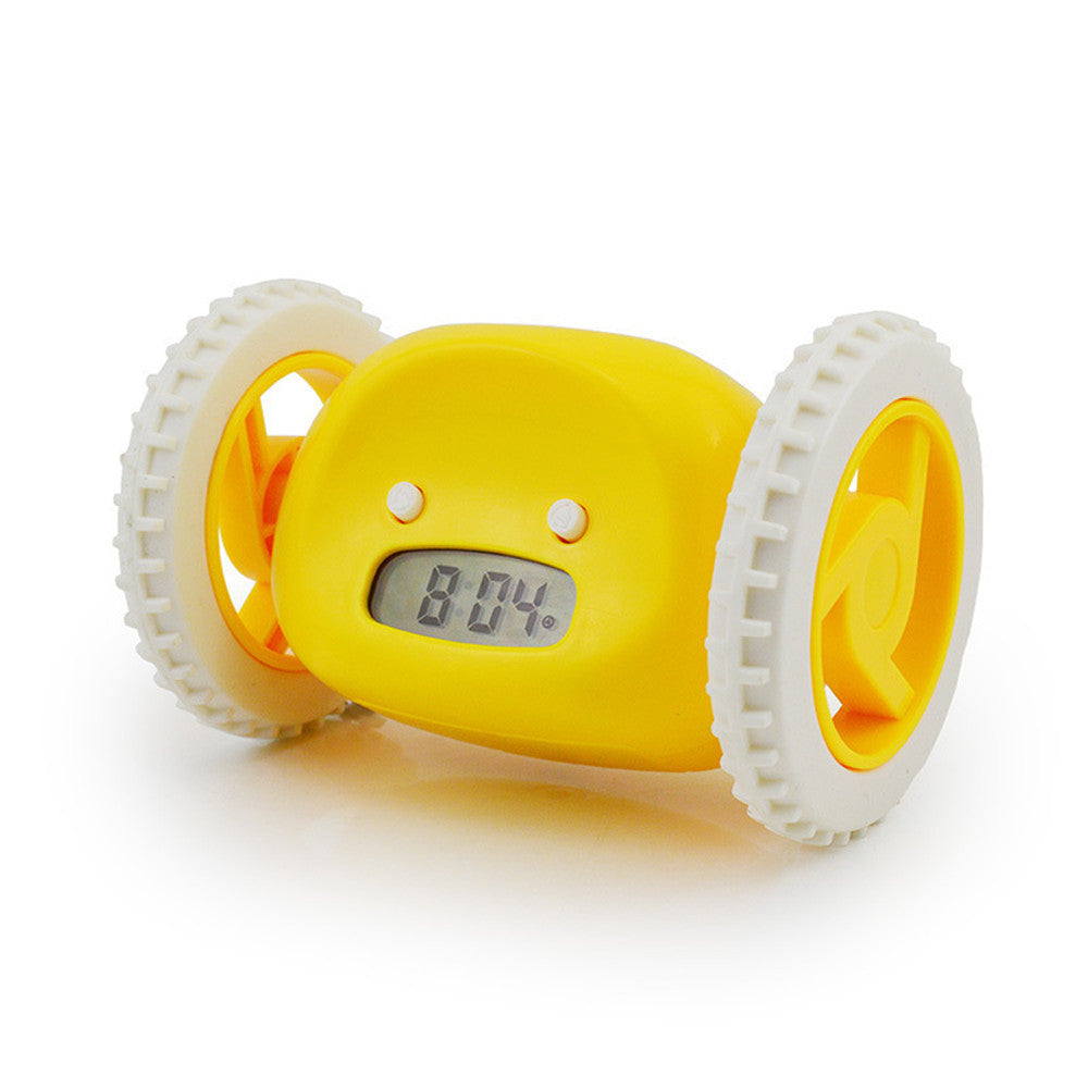 Yellow toy with wheels and digital display on a white background
