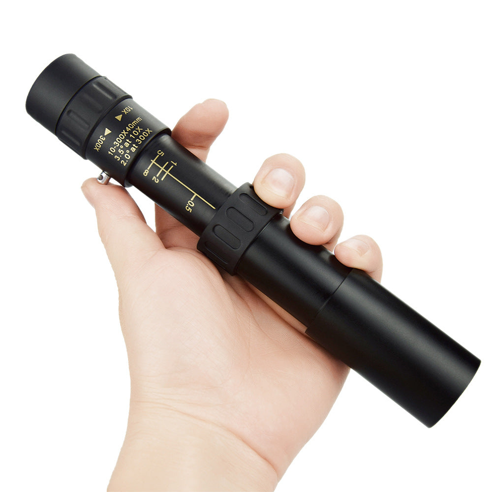 Hand holding a black penlight with measurement scale on a white background
