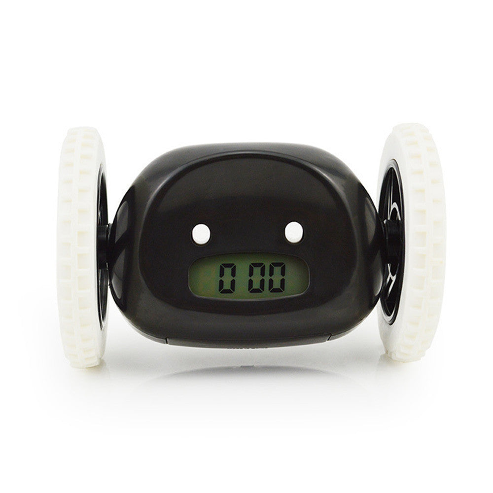 Black digital clock with white wheels on a white background